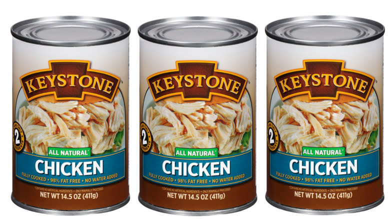 Three cans of Keystone All Natural Chicken