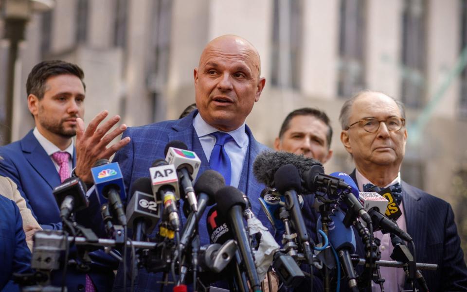 Arthur Aidala, Weinstein's lawyer, addresses the media after the ruling