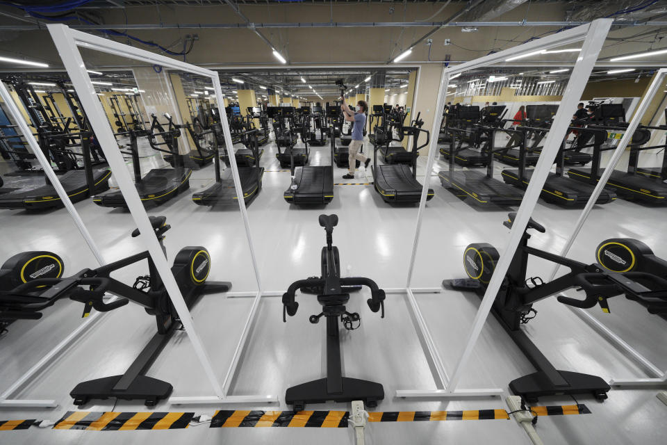 A gym at Tokyo 2020 Olympic and Paralympic Village is seen during the press tour Sunday, June 20, 2021, in Tokyo. (AP Photo/Eugene Hoshiko)