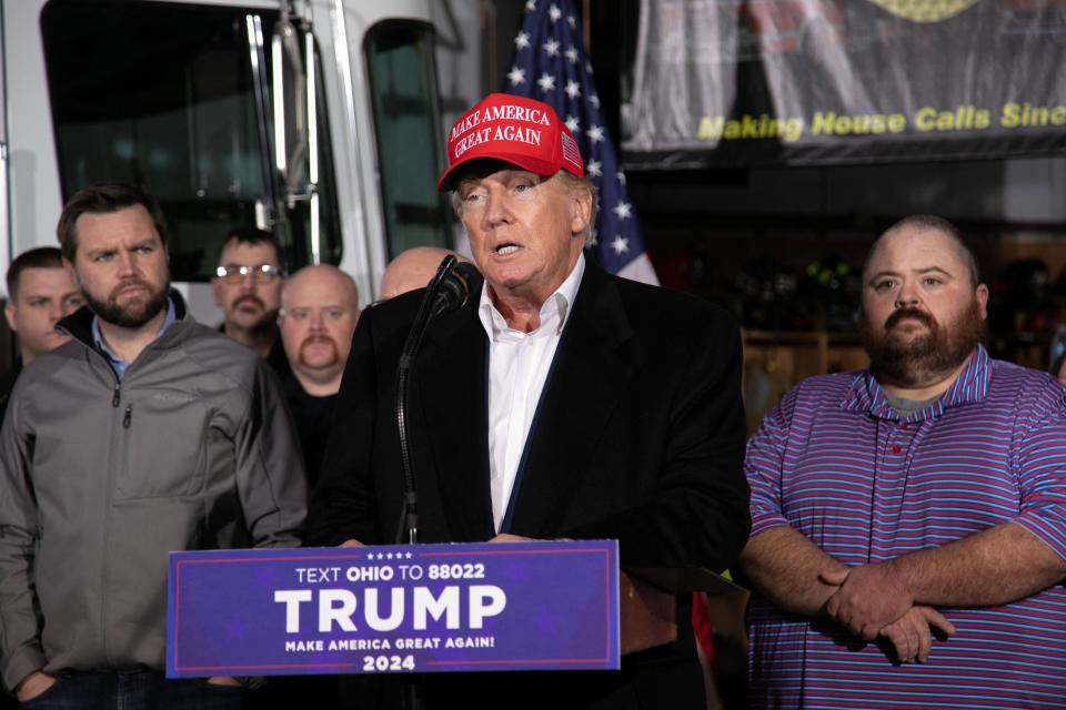 Former President Donald Trump speaks at the East Palestine Fire Department in February. A new poll shows Trump way ahead of President Biden in Ohio.