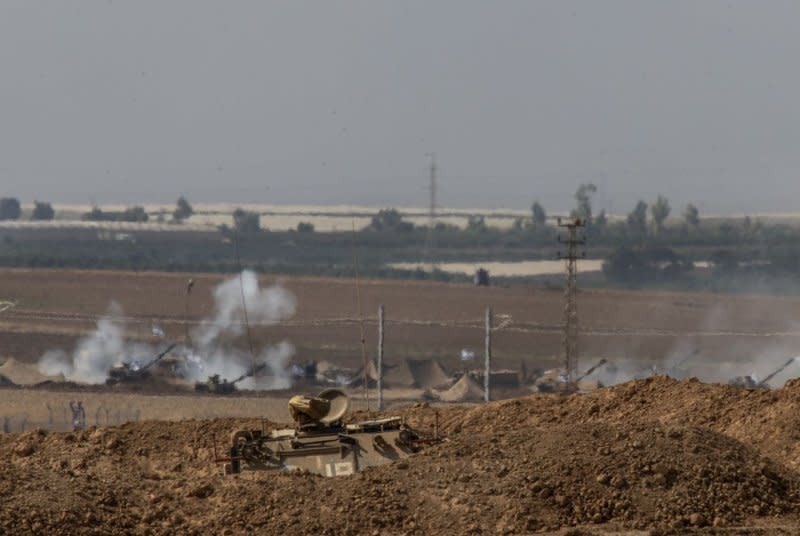 Israeli 155mm self-propelled Howitzers fire inside southern Israel into the Gaza Strip on Tuesday. Photo by Jim Hollander/UPI