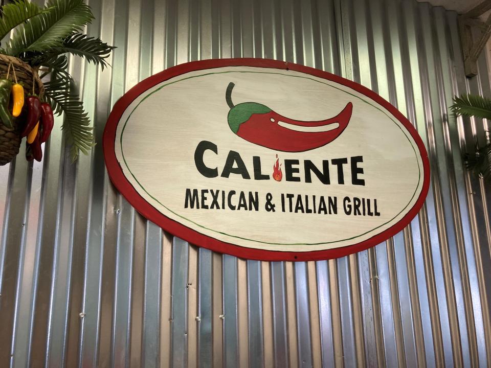 The logo for Caliente Mexican Grill instead the restaurant's Hebron location. Owners Chris and Heather Gutierrez are branching out beyond the brick-and-mortar location with a new food truck.