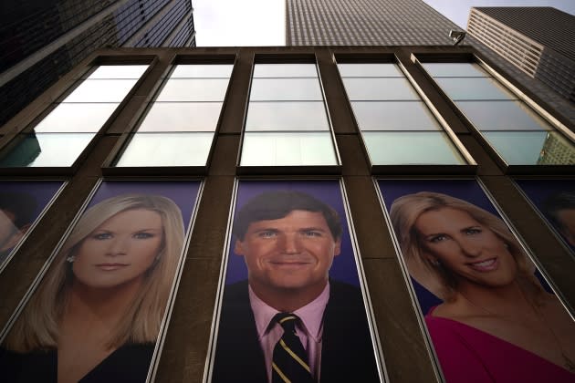 tucker-fox-dossier-2.jpg Protestors Call On Advertisers To Pull Their Ads From Fox News - Credit: Drew Angerer/Getty Images