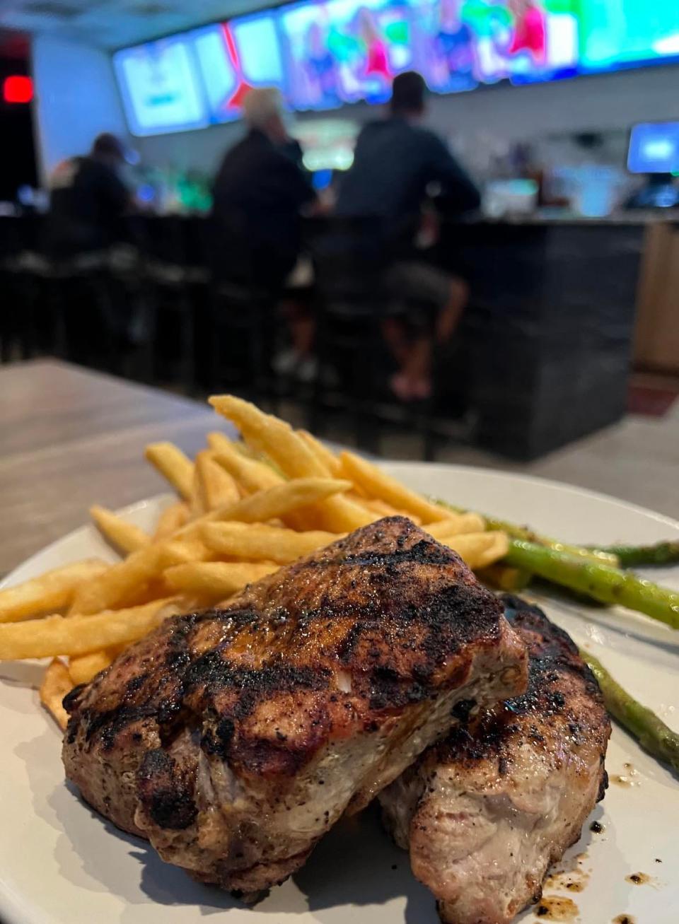 The grilled pork chops are among the tastier dishes at Loby's Grille on CLE in Canton.