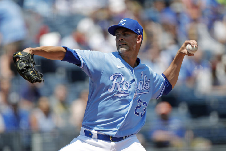 Kansas City Royals pitcher Mike Minor throws to a batter during the first inning of a baseball game against the Boston Red Sox at Kauffman Stadium in Kansas City, Mo., Sunday, June 20, 2021. (AP Photo/Colin E. Braley)