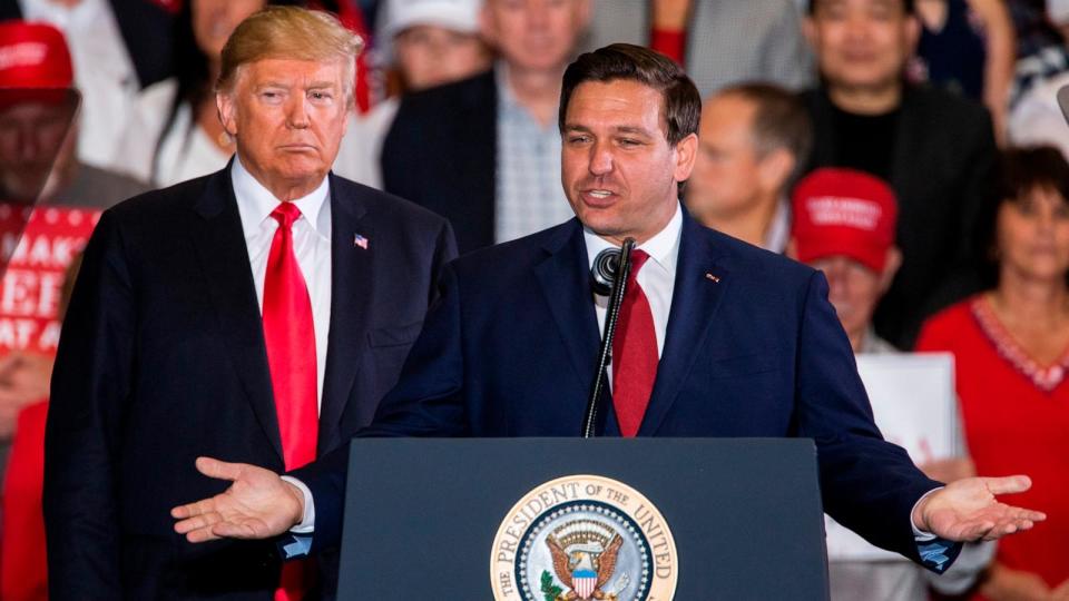 PHOTO: In this Nov. 3, 2018 file photo Florida Republican gubernatorial candidate Ron DeSantis speaks with President Donald Trump at a campaign rally at the Pensacola International Airport  in Pensacola, Fla. (Mark Wallheiser/Getty Images, FILE)