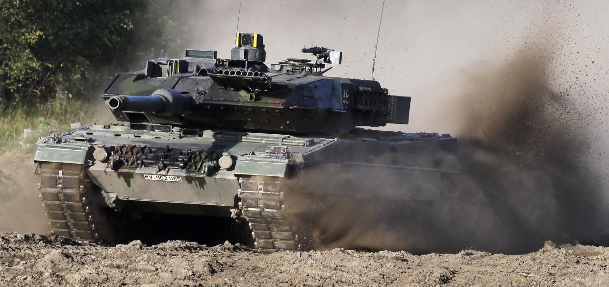 FILE -- A Leopard 2 tank is pictured during a demonstration event held for the media by the German Bundeswehr in Munster near Hannover, Germany, Wednesday, Sept. 28, 2011. The German government has confirmed it will provide Ukraine with Leopard 2 battle tanks and approve requests by other countries to do the same. Chancellor Olaf Scholz said Wednesday that Germany was “acting in close coordination” with its allies. (AP Photo/Michael Sohn, File)