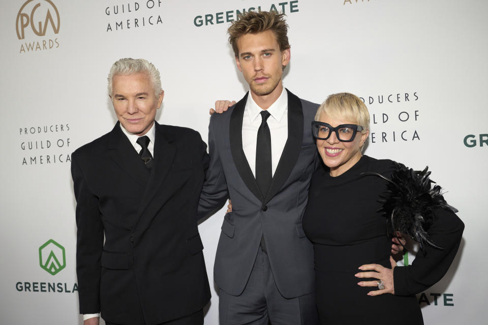 Baz Luhrmann, from left, Austin Butler, and Catherine Martin arrive at the 34th annual Producers Guild Awards on Saturday, Feb. 25, 2023, at the Beverly Hilton Hotel in Beverly Hills, Calif. (Photo by Allison Dinner/Invision/AP)