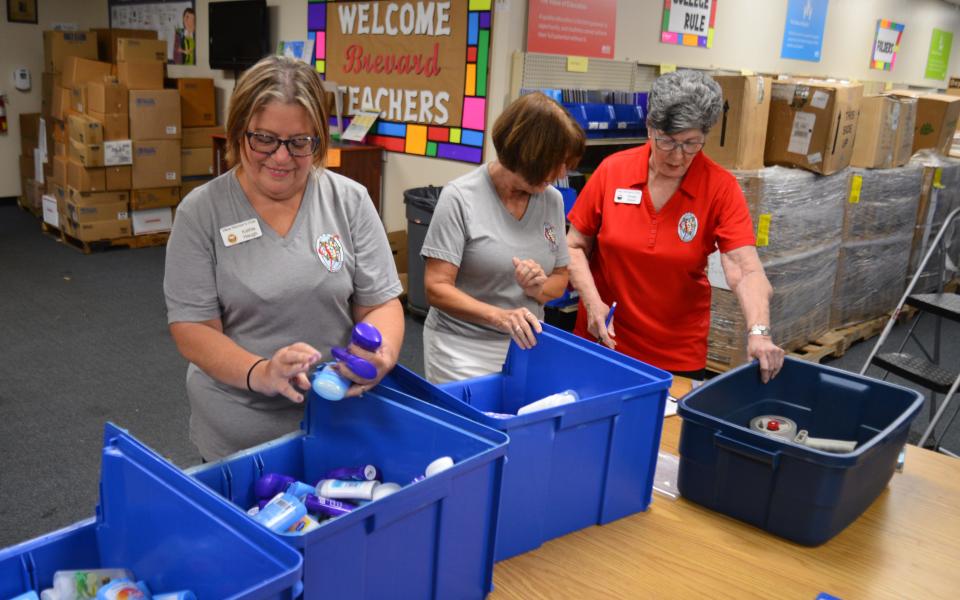 Volunteers Kathie Haugh, Debra Gorham and Sheila Albert with the Viera Women's Club organize hygiene products for backpacks. Collected and donated school supplies are stacking up at the Brevard Schools Foundation Supply Zone in Cocoa. Packing day, when supplies will be put in backpacks for students, is July 22 in the cafeteria at the Clearlake location from 9-1 p.m.