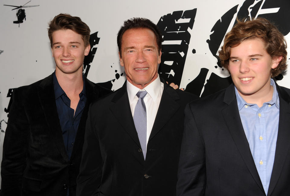 HOLLYWOOD, CA - JANUARY 14:  (L-R) Patrick Schwarzenegger, actor Arnold Schwarzenegger, and Christopher Schwarzenegger arrive at the premiere of Lionsgate Films' 