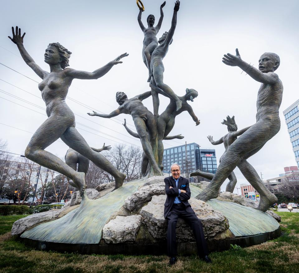 Charlie Monk is photographed in front of the “Musica” statue in the Music Row roundabout Tuesday, February 11, 2020.