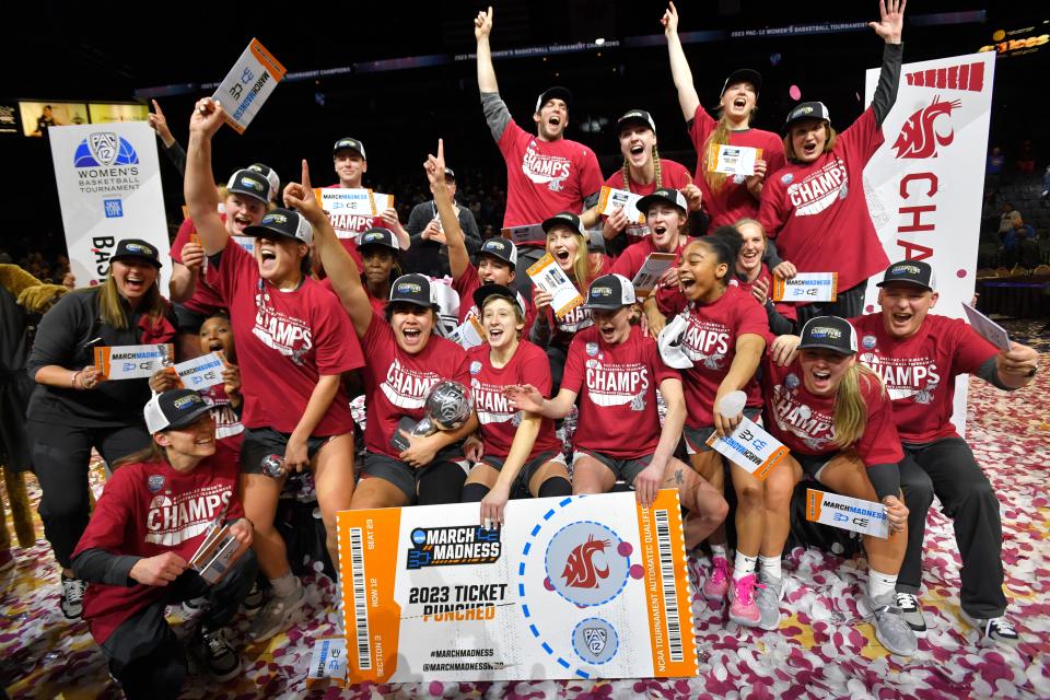 Washington State celebrates defeating UCLA in an NCAA college basketball game in the finals of the Pac-12 women's tournament, Sunday, March 5, 2023, in Las Vegas. (AP Photo/David Becker)