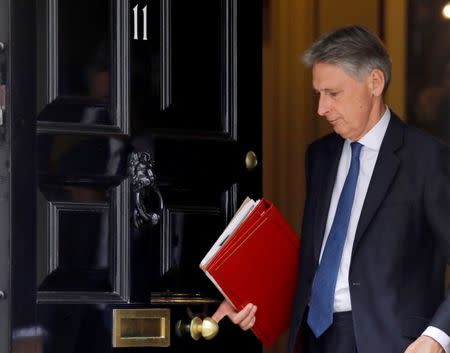 Britain's Chancellor of the Exchequer, Philip Hammond, leaves 11 Downing Street, in central London, Britain July 17, 2017. REUTERS/Tolga Akmen