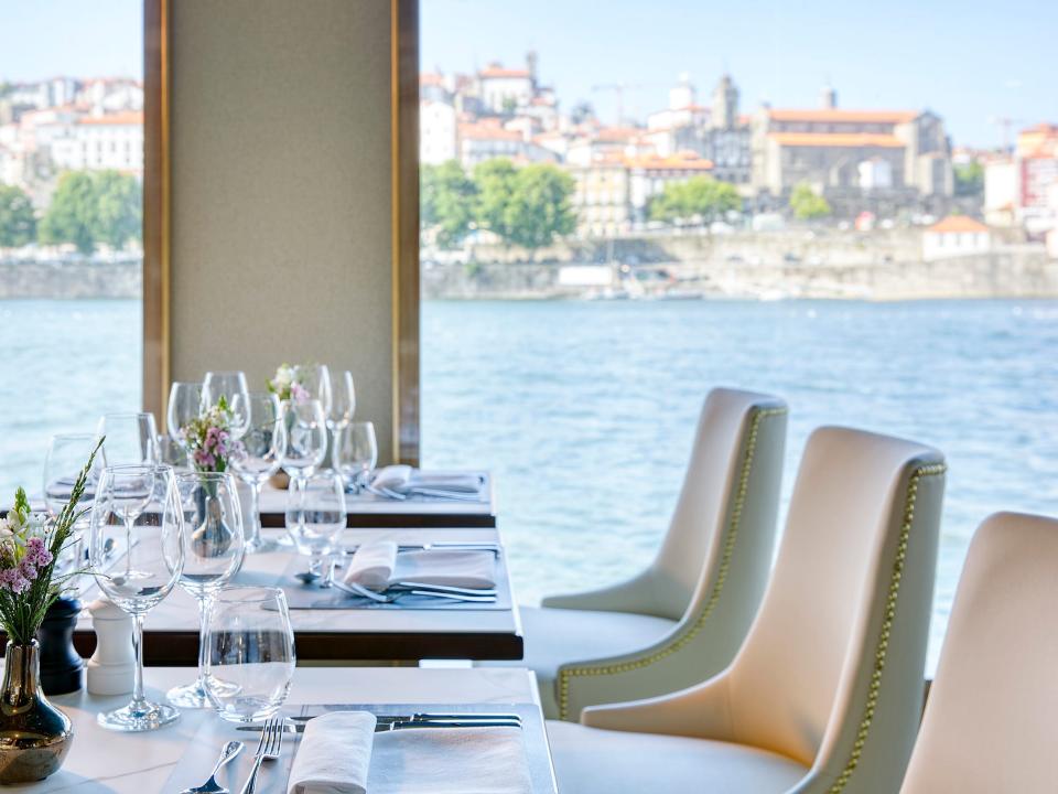 Inside a Uniworld cruise ship with a dining room