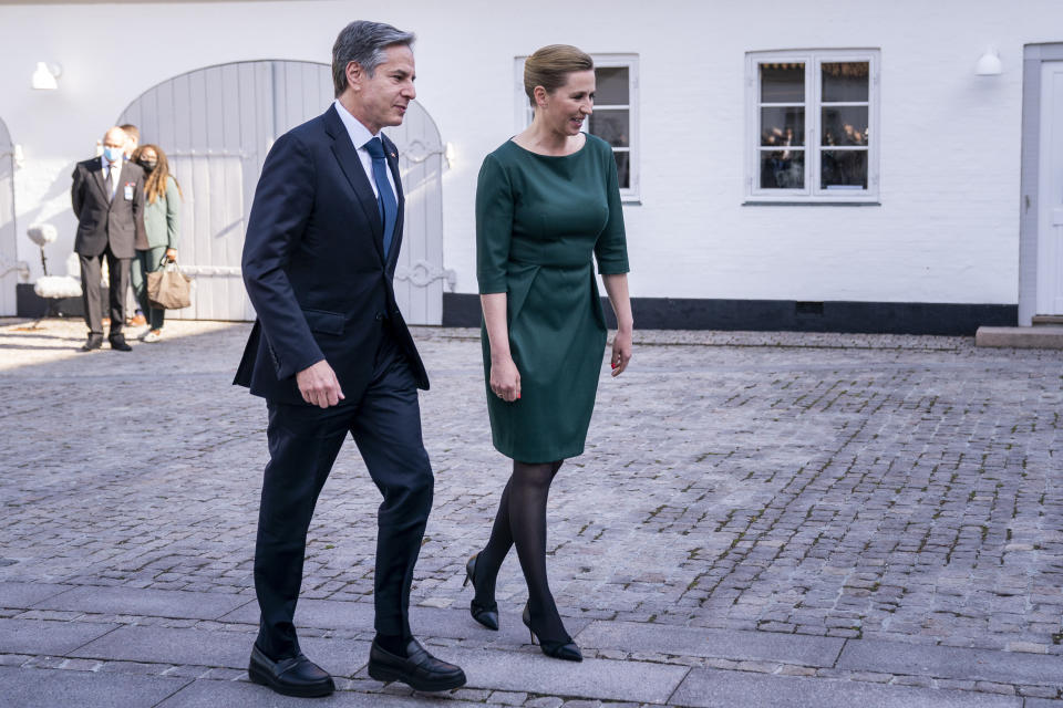 Danish Prime Minister Mette Frederiksen walks with US Secretary of State Antony Blinken as he arrives for meetings at Marienborg, the official residence of the Prime Minister, in Copenhagen, Denmark, May 17, 2021. U.S. Secretary of State Antony Blinken is in Denmark for talks on climate change, Arctic policy and Russia as calls grow for the Biden administration to take a tougher and more active stance on spiraling Israeli-Palestinian violence. (Saul Loeb/Pool photo via AP)
