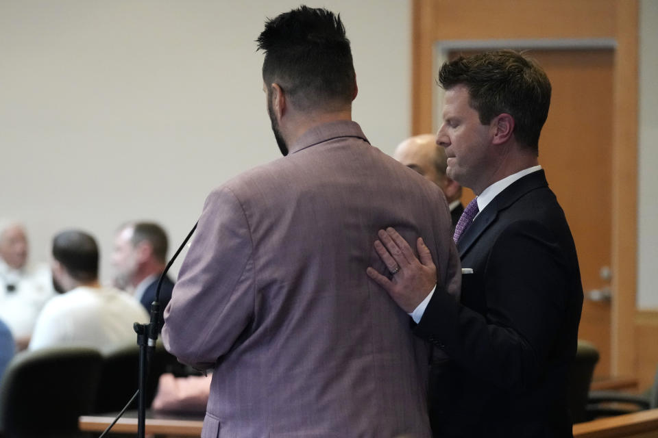 Blair, right, and Johnathon Bobbitt-Miller, adoptive parents of Harmony Montgomery's biological brother Jamison, address the court during the Adam Montgomery sentencing hearing at Hillsborough Superior Court, Thursday, May 9, 2024, in Manchester N.H. Montgomery was found guilty of second-degree murder earlier in the year in the death of his 5-year-old daughter, Harmony, who police believe was killed nearly two years before she was reported missing in 2021 and whose body was never found. (AP Photo/Charles Krupa)