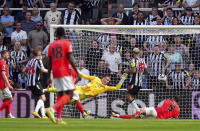 Newcastle United's Sean Longstaff scores his side's first goal of the game, during the English Premier League soccer match between Newcastle United and Brighton & Hove Albion, at St. James' Park, in Newcastle, England, Saturday May 11, 2024. (Owen Humphreys/PA via AP)