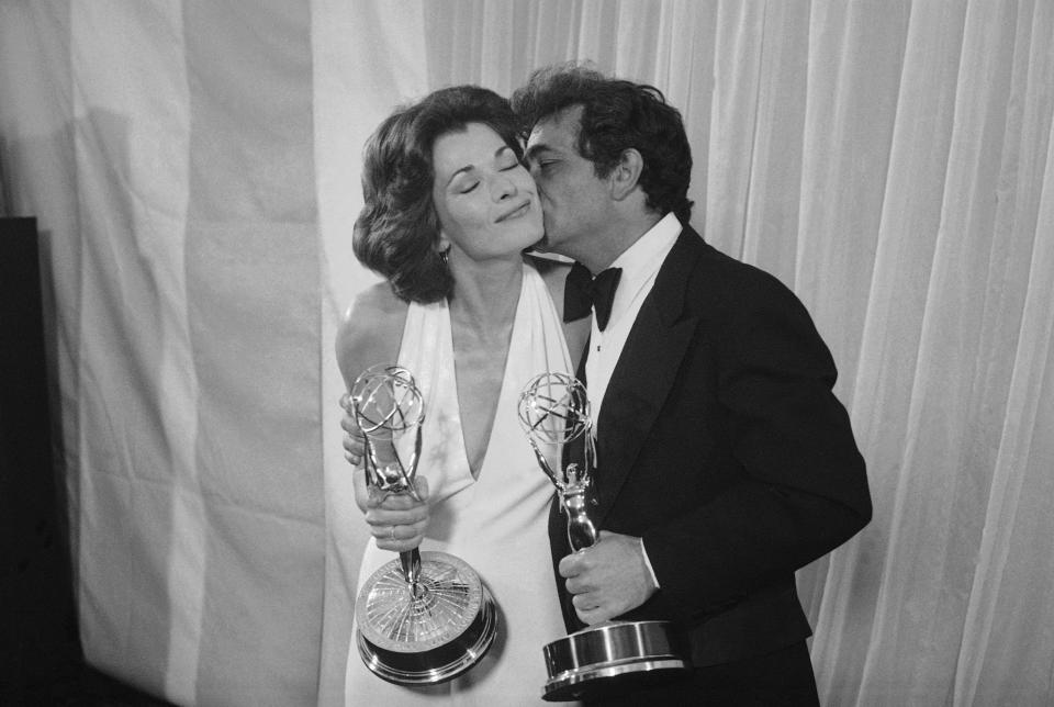 Peter Falk of "Columbo" gives Jessica Walter of "Amy Prentice" a kiss after both won Emmys on Monday, May 19, 1975. Falk was named best actor in a lined series while Walter won for best actress in a limited series.