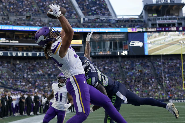 Seattle Seahawks wide receiver Jake Bobo (19) runs with the ball and scores  a touchdown during an NFL pre-season football game against the Minnesota  Vikings, Thursday, Aug. 10, 2023 in Seattle. (AP