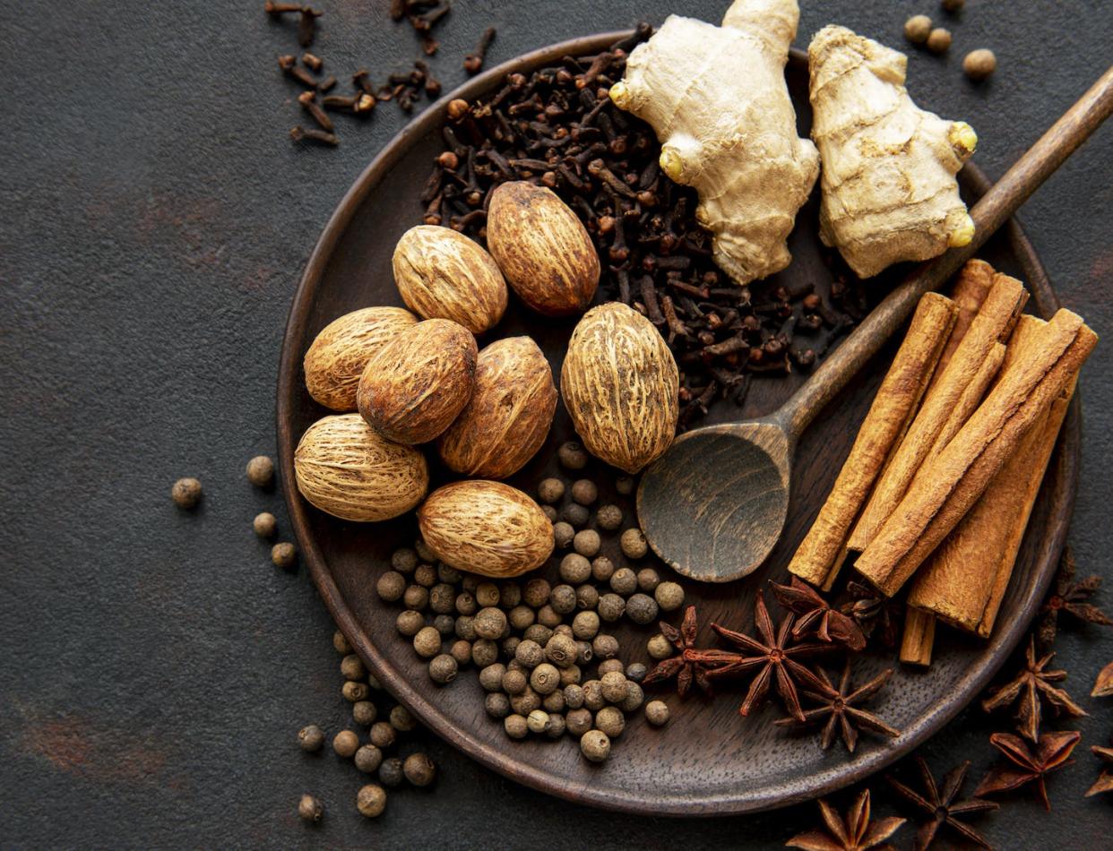 Nutmeg, ginger, cinnamon and other gingerbread spices. <a href="https://www.gettyimages.com/detail/photo/gingerbread-spices-on-slate-star-anise-cinnamon-royalty-free-image/1297922082" rel="nofollow noopener" target="_blank" data-ylk="slk:Almaje/iStock via Getty Images;elm:context_link;itc:0;sec:content-canvas" class="link ">Almaje/iStock via Getty Images</a>
