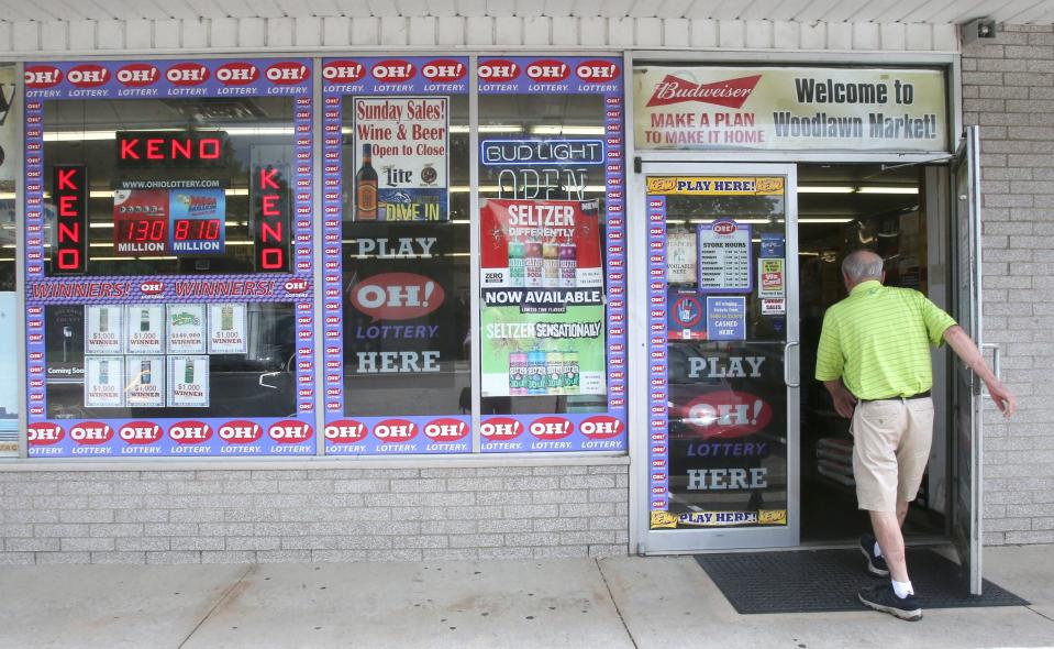 A customer walks into the Woodlawn Market in Jackson Township on Monday. Owner Ricky Patel anticipates thousands of people will visit Tuesday to buy Mega Millions tickets because the jackpot had reached $810 million Monday afternoon.