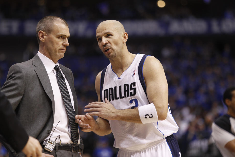 FILE- In this May 17, 2011, file photo, Dallas Mavericks' Rick Carlisle and Jason Kidd talk during Game 1 of the NBA basketball Western Conference finals against the Oklahoma City Thunder in Dallas. Kidd is coming back to Dallas again, this time to replace the coach he won a championship with as the point guard of the Mavericks 10 years ago. A person with direct knowledge of the agreement says Kidd and the Mavericks agreed on a contract Friday, June 25, 2021, eight days after Carlisle resigned abruptly in the wake of general manager Donnie Nelson’s departure. (AP Photo/Eric Gay, File)