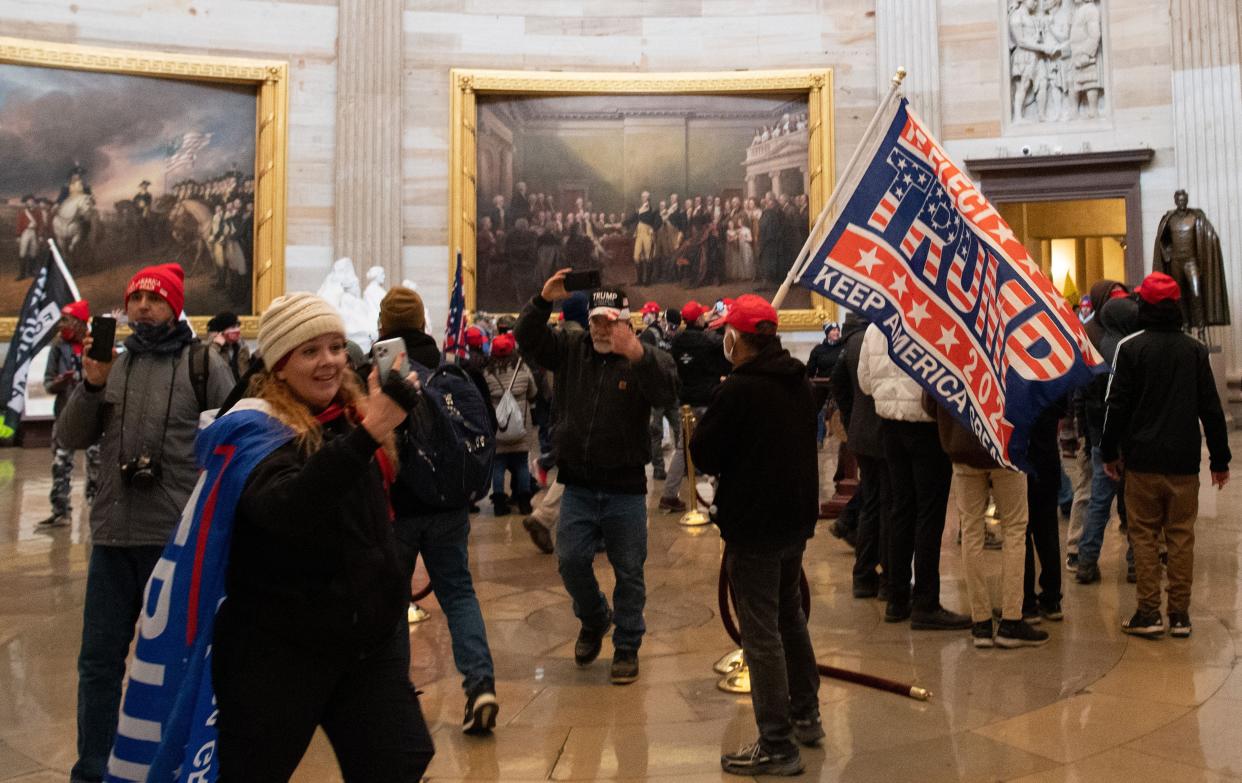 Supporters of US President Donald Trump enter the US Capitol's Rotunda on Jan. 6, 2021, in Washington, DC. Demonstrators breached security and entered the Capitol as Congress debated the 2020 presidential election Electoral Vote Certification.