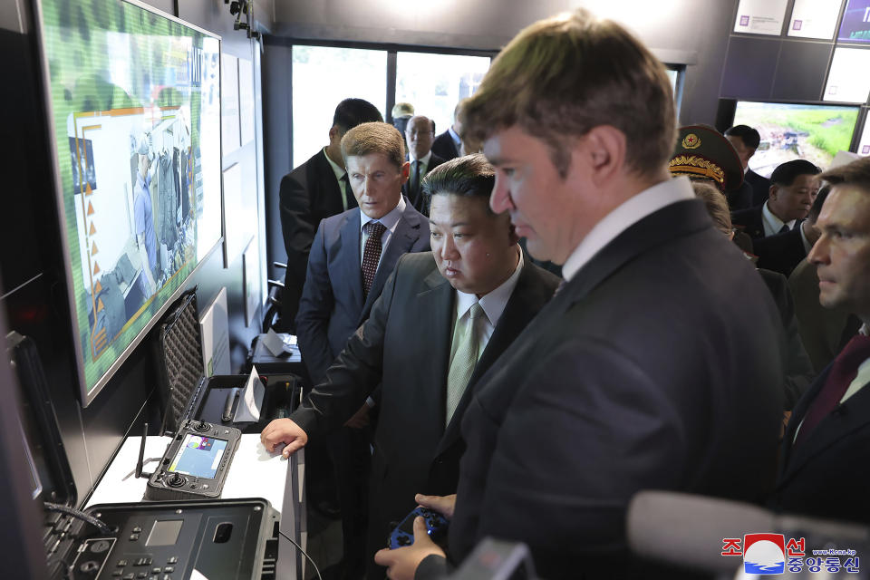 In this photo provided by the North Korean government, North Korea leader Kim Jong Un, center, visits the Far Eastern Federal University in Russky Island, Vladivostok, Russian Far East Sunday, Sept. 17, 2023. Independent journalists were not given access to cover the event depicted in this image distributed by the North Korean government. The content of this image is as provided and cannot be independently verified. Korean language watermark on image as provided by source reads: "KCNA" which is the abbreviation for Korean Central News Agency. (Korean Central News Agency/Korea News Service via AP)