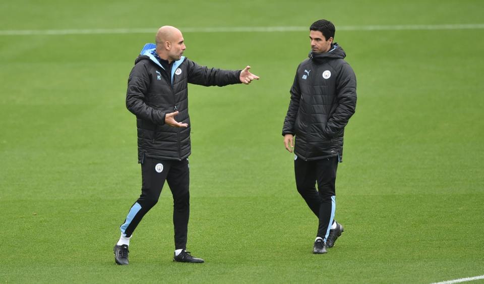 Pep Guardiola and Mikel Arteta during their time together at Manchester City (Getty Images)