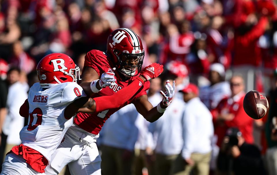 Oct 21, 2023; Bloomington, Indiana, USA; Indiana Hoosiers wide receiver Donaven McCulley (1) misses a pass under coverage of Rutgers Scarlet Knights defensive back Eric Rogers (0) during the first quarter at Memorial Stadium. Mandatory Credit: Marc Lebryk-USA TODAY Sports