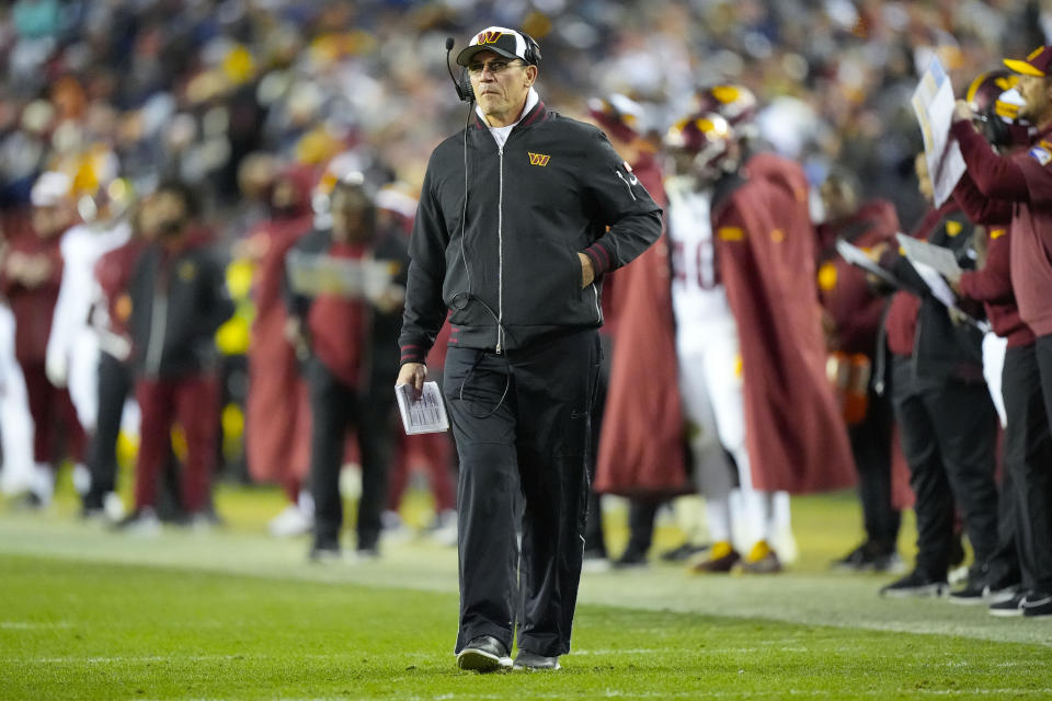 Washington Commanders head coach Ron Rivera walking on the sidelines during the first half of an NFL football game against the Dallas Cowboys, Sunday, Jan. 7, 2024, in Landover, Md. (AP Photo/Mark Schiefelbein)