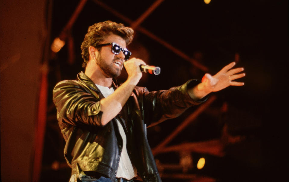 English Pop singer George Michael (1963 - 2016), of the group Wham, performs at Live Aid, Wembley Stadium, London, 7/13/1985. (Photo by Steve Rapport/Getty Images)