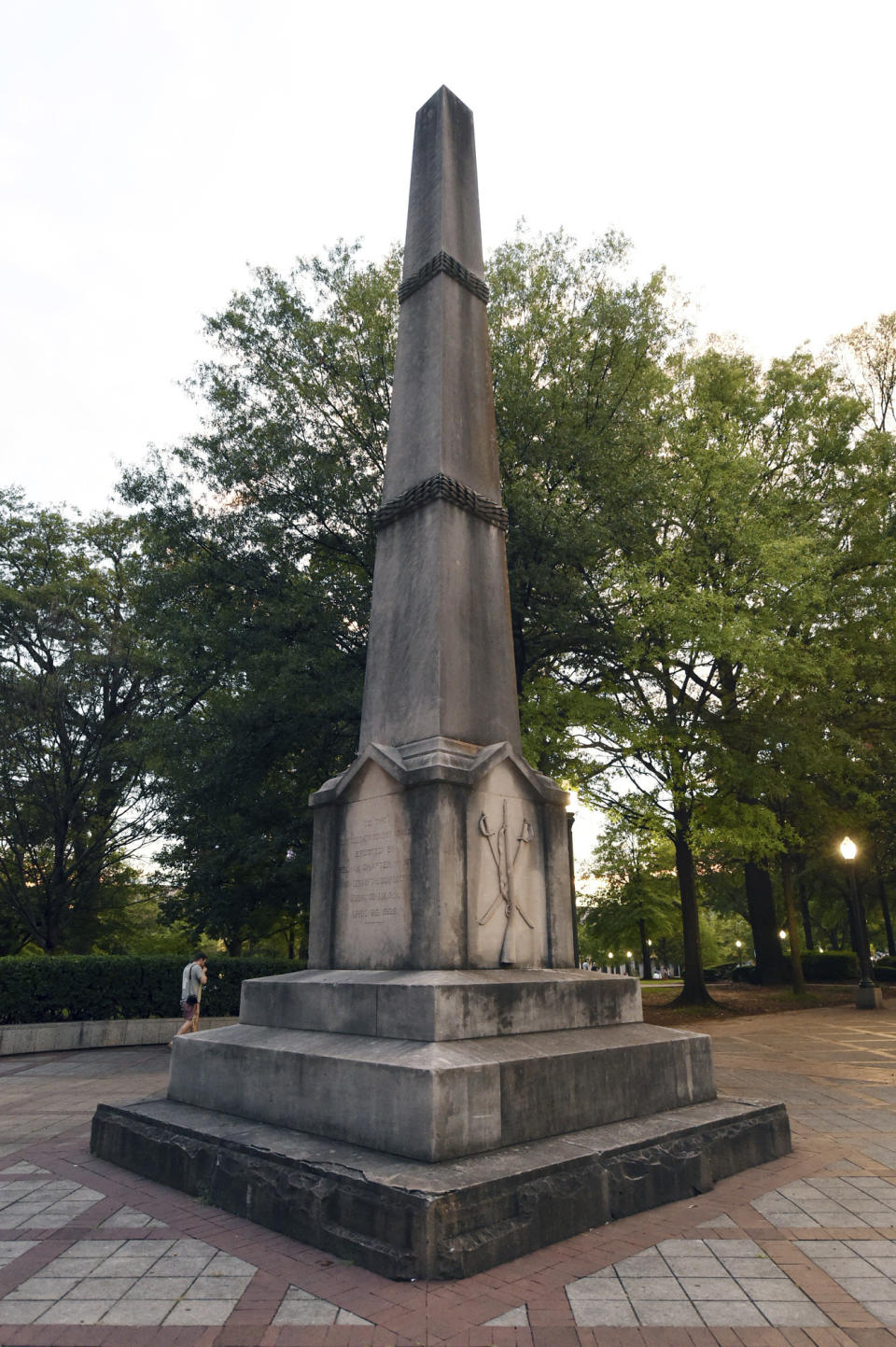 <p>A man walks past the Confederate Monument in Birmingham, Ala. on Tuesday, Aug. 15, 2017. The city’s Mayor William Bell ordered Birmingham city workers to cover the monument in Linn Park. (Photo: Joe Songer /AL.com via AP) </p>