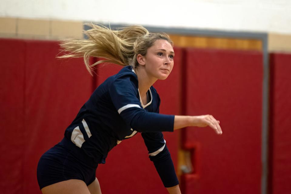 Rootstown’s Jessica Hahn hits a shot across the net during Monday night’s game at Crestwood High School.