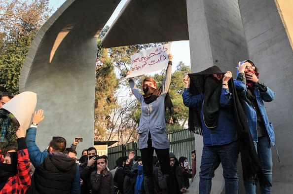 Iranian students protest at the University of Tehran during a demonstration driven by anger over economic problems, in the capital Tehran on December 30, 2017. Students protested in a third day of demonstrations, videos on social media showed, but were outnumbered by counter-demonstrators.(Photo credit STR/AFP/Getty Images)