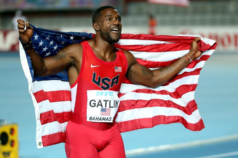 Justin Gatlin celebrates after winning the final of the men's 4 x 100 metres on day one of the IAAF World Relays on May 2, 2015 in Nassau