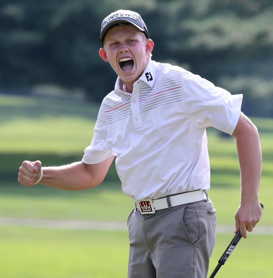 Maxwell Moldovan reacts to winning the 2019 Stark County Amateur Golf Championship with a birdie putt on the first playoff hole.