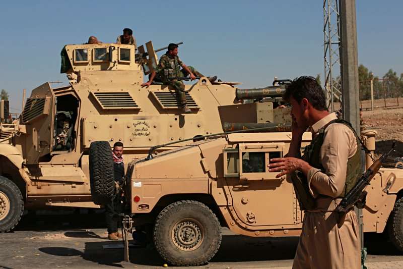 庫德族武裝部隊撤出基爾庫克，伊拉克政府軍輕鬆進佔。（美聯社）