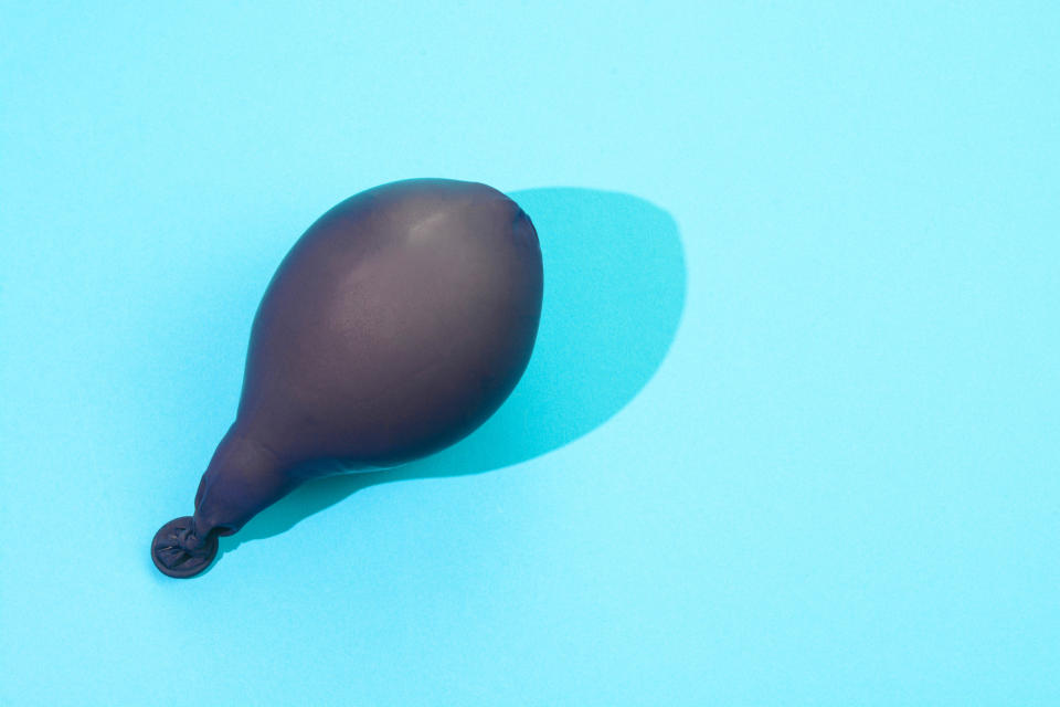 Inflated balloon on a plain surface, relevant to an article on Sex & Love