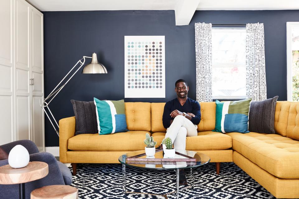 At first, Brown wasn't a fan of the mustard-hued sofa. But he admits: "When I saw it in the space, I was like, ‘Yo, this is kind of baller. I’m digging it.’”