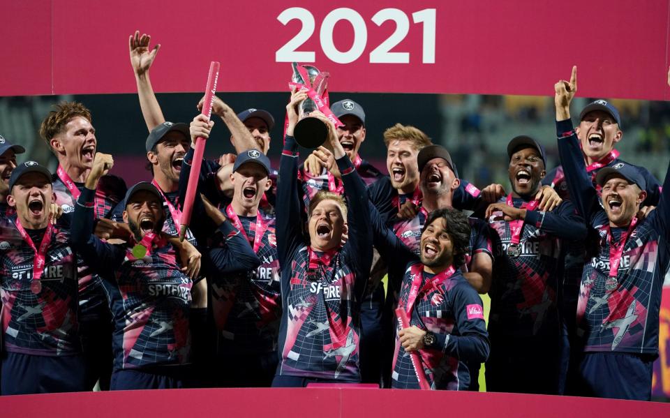 Sam Billings lifts the trophy after a comfortable win in the final. - PA