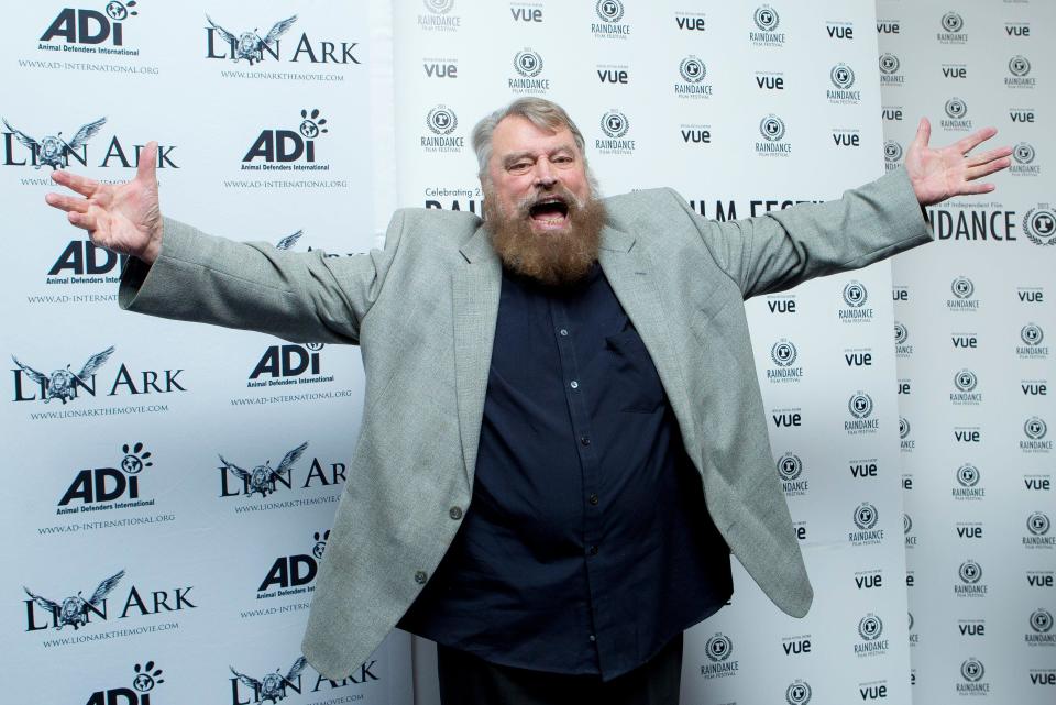 Actor and host Brian Blessed gestures as he arrives for the World Premiere of the documentary, Lion Ark, as part of the Raindance Film Festival, at a central London cinema, Tuesday, Oct. 1, 2013. (Photo by Joel Ryan/Invision/AP)