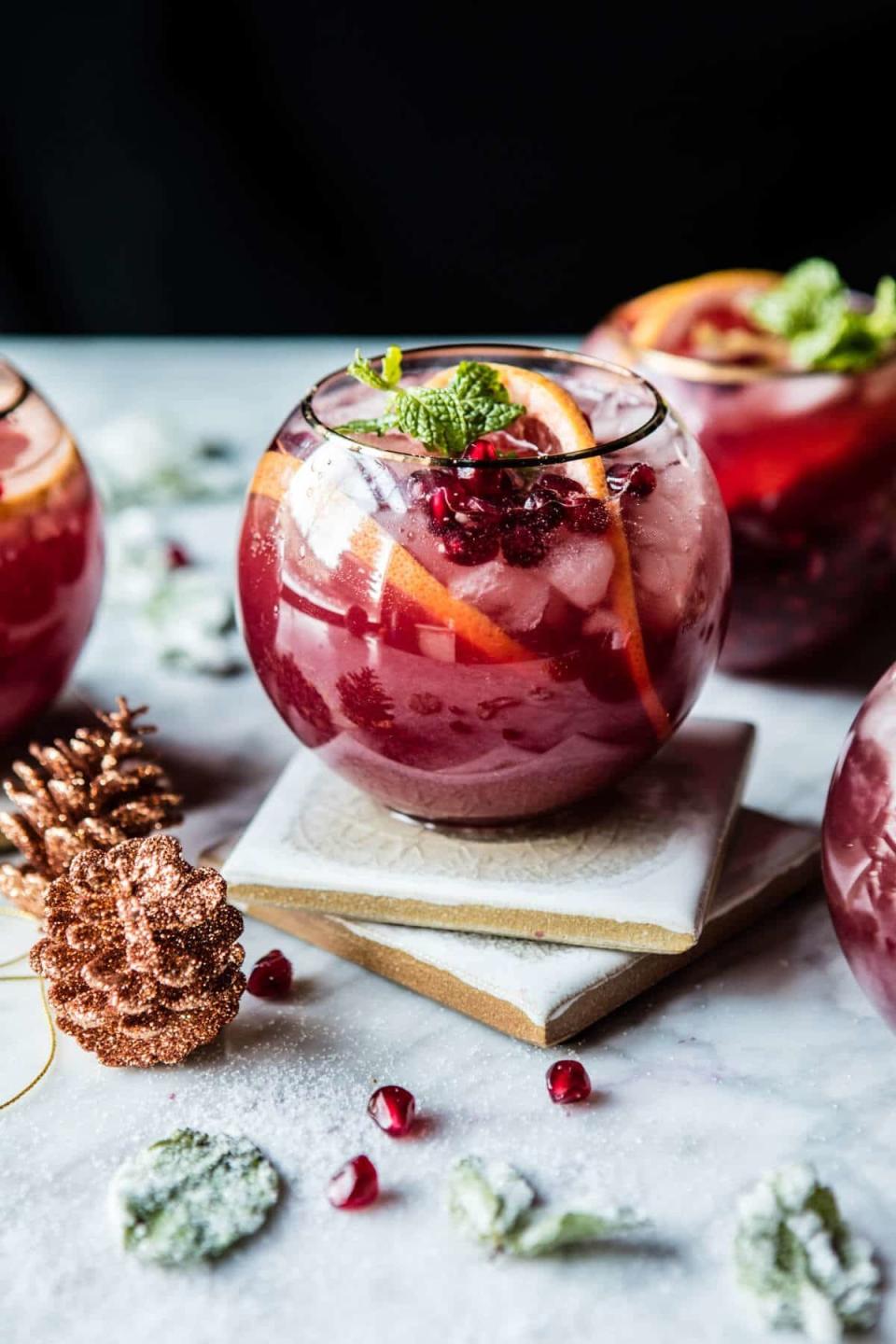 <strong>Get the <a href="https://www.halfbakedharvest.com/pomegranate-ginger-paloma/" target="_blank">Pomegranate Ginger Paloma</a> recipe from Half Baked Harvest</strong>