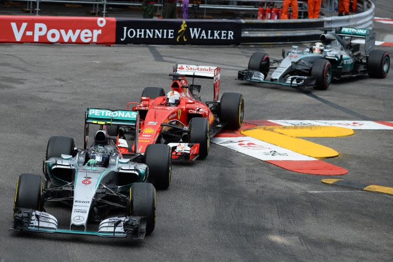 (L-R) Nico Rosberg, Sebastian Vettel and Lewis Hamilton drive at the Monaco street circuit in Monte-Carlo on May 24, 2015, during the Monaco Formula One Grand Prix