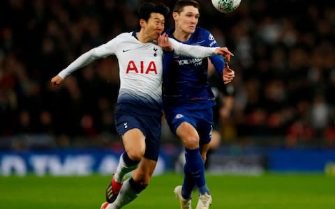Chelsea's Danish defender Andreas Christensen (R) vies with Tottenham Hotspur's South Korean striker Son Heung-Min during the English during the English League Cup semi-final first-leg football match between Tottenham Hotspur and Chelsea at Wembley Stadium in London - Credit: AFP