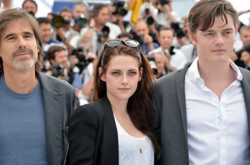 (From left) Brazilian director Walter Salles, US actress Kristen Stewart and British actor Sam Riley pose during the photocall of "On the Road" at the 65th Cannes Film Festival on May 23. The film adaptation of Jack Kerouac's cult novel, a sex, drugs and booze-fuelled hymn to youthful freedom, hit the big screen in Cannes Wednesday with British actor Riley in the driving seat