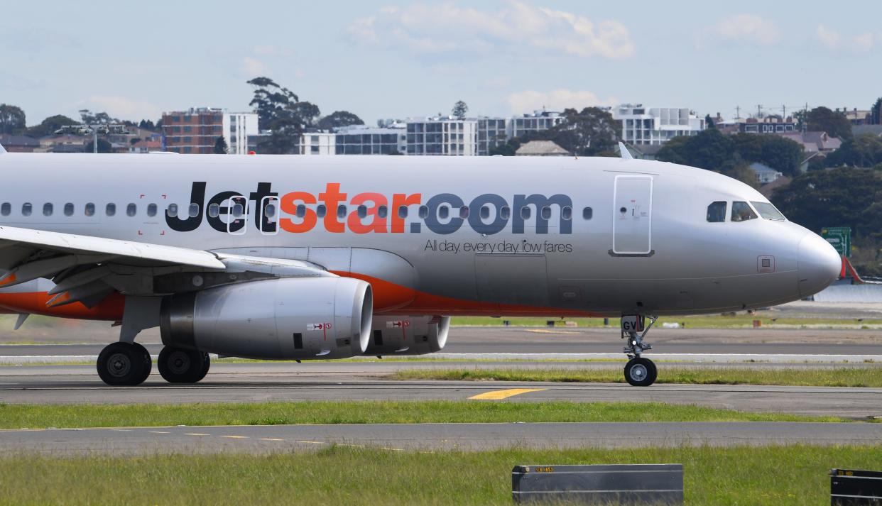 A Jetstar Airbus A320, flight number JQ510, lands at Sydney Airport from Melbourne on August 4, 2020 in Sydney, Australia.