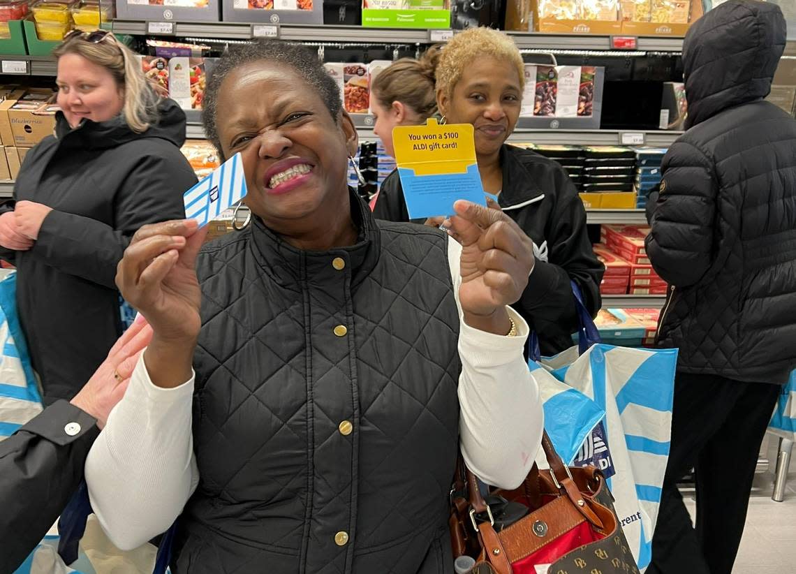 Denise Huggins of Bluffton was excited to win a $100 gift card at the opening of the new Aldi grocery store on Fording Island Road on Thursday, Jan. 26, 2023.
