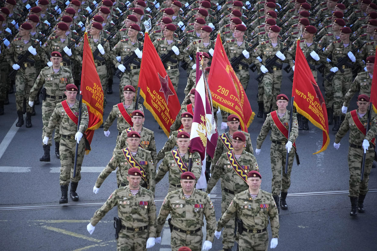 Russian soldiers march toward Red Square to attend a Victory Day military parade in Moscow, Russia, Tuesday, May 9, 2023, marking the 78th anniversary of the end of World War II. (AP Photo/Alexander Zemlianichenko)