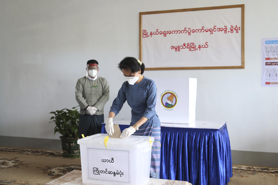 Myanmar's leader Aung San Suu Kyi makes an early voting for upcoming Nov. 8 general election at Union Election Commission office, Thursday, Oct. 29, 2020, in Naypyitaw, Myanmar. (AP Photo/Aung Shine Oo)